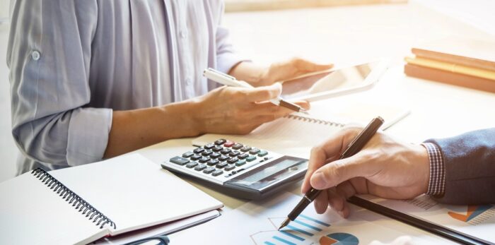 business man financial inspector and secretary making report, ca